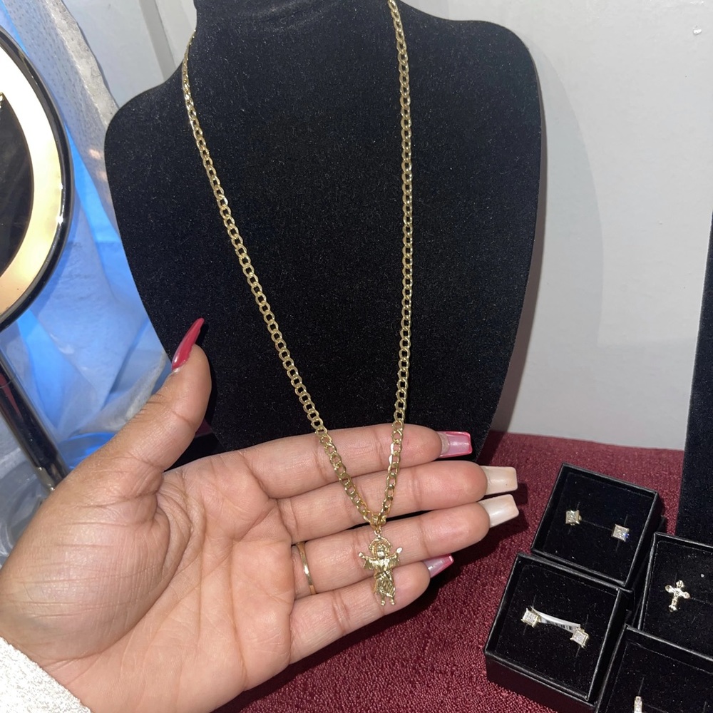 14k gold hollow Cuban chain with divine pendant length 20” width 4.2mm